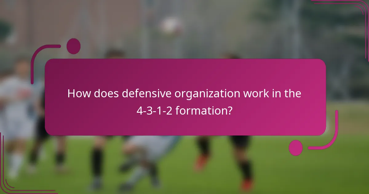 How does defensive organization work in the 4-3-1-2 formation?