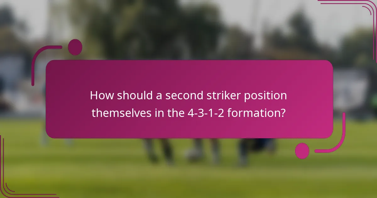 How should a second striker position themselves in the 4-3-1-2 formation?