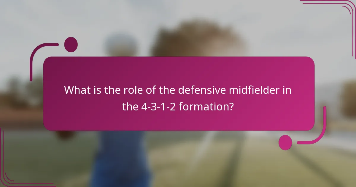 What is the role of the defensive midfielder in the 4-3-1-2 formation?