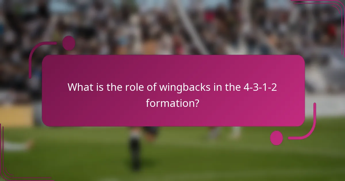 What is the role of wingbacks in the 4-3-1-2 formation?