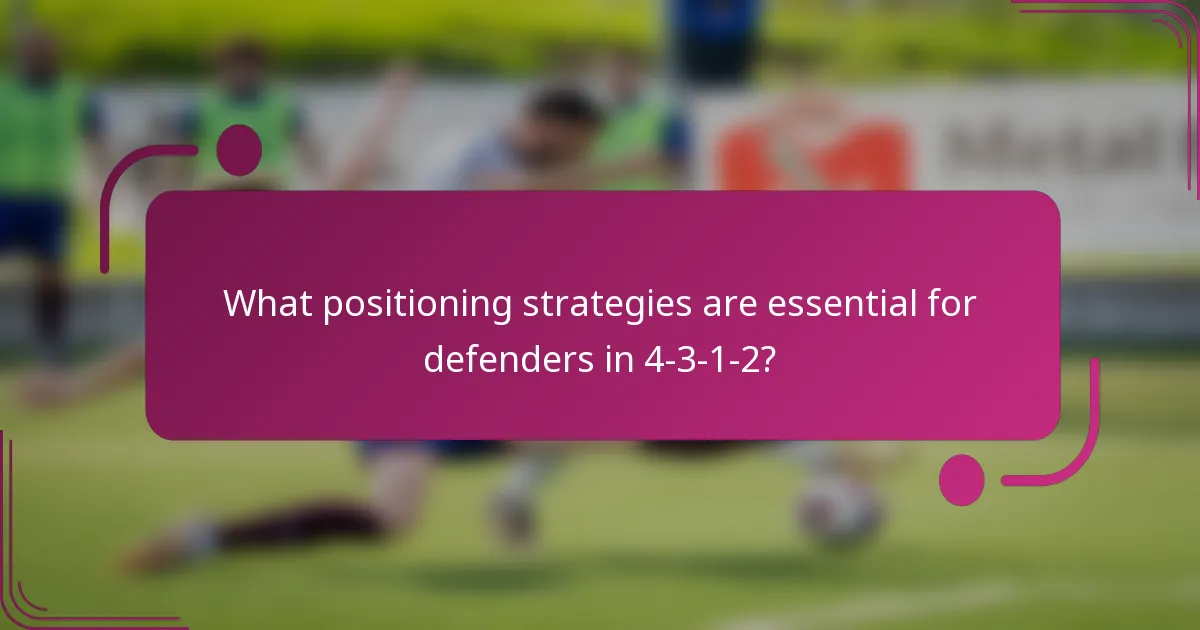 What positioning strategies are essential for defenders in 4-3-1-2?